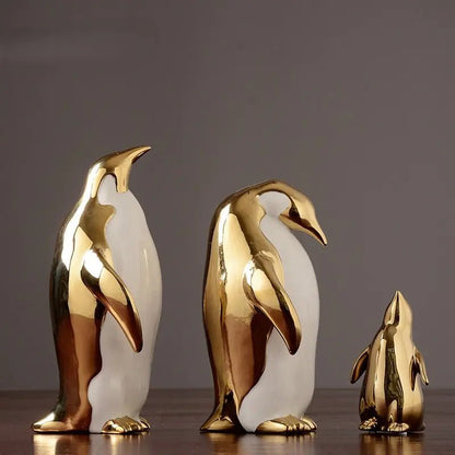 Figuras Decorativas de Pingüinos en Cerámica (Acabado en Oro) - Zenvora