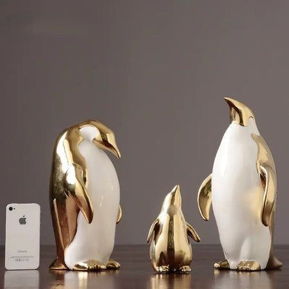 Figuras Decorativas de Pingüinos en Cerámica (Acabado en Oro) - Zenvora